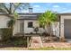 Charming home with a manicured front yard and a brick pathway leading to the front door at 3203 S Polk Ave, Lakeland, FL 33803