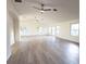 Large open concept living room with hardwood floors and natural light at 3203 S Polk Ave, Lakeland, FL 33803