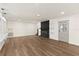 A cozy living room features a charming fireplace and leads to the entryway at 3203 S Polk Ave, Lakeland, FL 33803