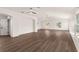 Bright and airy living room with modern flooring, neutral walls, and many windows at 3203 S Polk Ave, Lakeland, FL 33803