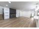 Bright living room with fireplace and built-in shelving, next to the kitchen at 3203 S Polk Ave, Lakeland, FL 33803