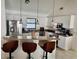 Modern kitchen with stainless steel appliances and breakfast bar at 341 N Fork Dr, Lakeland, FL 33809