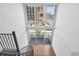 Bright entryway featuring a spiral staircase, hardwood floors, and a modern starburst chandelier at 150 E Robinson St # 221, Orlando, FL 32801