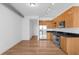 Bright kitchen featuring stainless steel appliances and wooden cabinetry, offering a functional space at 150 E Robinson St # 221, Orlando, FL 32801