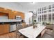 Contemporary condo with spiral staircase, and modern kitchen flows into the dining and living area at 150 E Robinson St # 221, Orlando, FL 32801