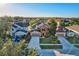 Aerial view of a residential neighborhood with houses and landscaping at 2804 Polson Dr, Kissimmee, FL 34758