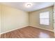 Simple bedroom with light walls and wood flooring at 2804 Polson Dr, Kissimmee, FL 34758