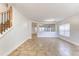 Foyer with tile flooring and a staircase with an iron railing at 2804 Polson Dr, Kissimmee, FL 34758