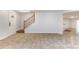 Foyer with tile flooring and a staircase with an iron railing at 2804 Polson Dr, Kissimmee, FL 34758