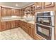 Well-equipped kitchen with double oven and granite countertops at 2804 Polson Dr, Kissimmee, FL 34758