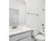 Bright bathroom with a white vanity, a combination tub and shower at 520 Astera Winds Ln, Lake Mary, FL 32746