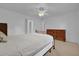 Bedroom with double bed and ample closet space at 509 E Lakeshore Dr, Ocoee, FL 34761