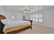 Spacious bedroom with large bed and window at 509 E Lakeshore Dr, Ocoee, FL 34761