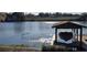 Private boat dock on calm lake at 509 E Lakeshore Dr, Ocoee, FL 34761