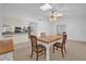 Dining area with kitchen access and skylights at 509 E Lakeshore Dr, Ocoee, FL 34761