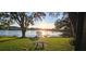 Serene lake view from backyard at 509 E Lakeshore Dr, Ocoee, FL 34761