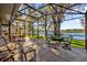 Spacious screened-in porch with lake view at 509 E Lakeshore Dr, Ocoee, FL 34761