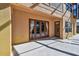 Back patio with French doors leading to the pool area at 2024 Capri Ln, Mount Dora, FL 32757