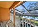 Relaxing balcony with lake and pool views at 2024 Capri Ln, Mount Dora, FL 32757