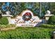 Welcoming Loch Leven community sign in Mount Dora, Florida decorated with a festive holiday wreath at 2024 Capri Ln, Mount Dora, FL 32757