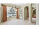 Dining area with large windows offering views of the lake at 2024 Capri Ln, Mount Dora, FL 32757