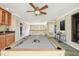 This spacious game room boasts a pool table, wet bar, and lots of natural light at 2024 Capri Ln, Mount Dora, FL 32757