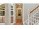 Hallway features archway and staircase at 2024 Capri Ln, Mount Dora, FL 32757