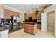 Modern kitchen features stainless steel appliances, granite countertops, and plenty of cabinet space at 2024 Capri Ln, Mount Dora, FL 32757