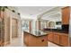 Spacious kitchen with island, lake view, and ample cabinet space at 2024 Capri Ln, Mount Dora, FL 32757
