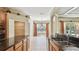 Bright kitchen with dark granite countertops, stainless appliances, and lake view at 2024 Capri Ln, Mount Dora, FL 32757