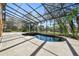 Enjoy this relaxing pool and spa with lake view at 2024 Capri Ln, Mount Dora, FL 32757