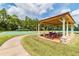 Community picnic area with tables, benches, and scenic views at 2024 Capri Ln, Mount Dora, FL 32757