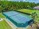 Scenic tennis court area, ideal for active community engagement and recreation at 2024 Capri Ln, Mount Dora, FL 32757