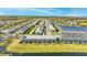 Wide aerial view of the townhome community and surrounding landscape at 7614 Oak Spring Ln, Davenport, FL 33837
