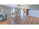 Cozy dining area next to the kitchen with wood floors, great natural light, and seating for four at 169 Vista View Ave, Eagle Lake, FL 33839