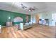 Spacious main bedroom suite with hardwood flooring, sitting area, and generous lighting at 169 Vista View Ave, Eagle Lake, FL 33839
