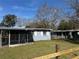 The property includes a fenced-in backyard, offering privacy and space for recreation and outdoor living at 1224 10Th St, Holly Hill, FL 32117
