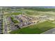 Aerial view of new home construction in a planned community at 4430 Petunia St, Lake Hamilton, FL 33851
