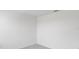 This is a standard bedroom with painted white walls and a gray carpet at 4430 Petunia St, Lake Hamilton, FL 33851
