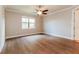 Spacious bedroom with hardwood floors and ceiling fan at 368 Toldedo Rd, Davenport, FL 33837