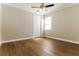 Bright bedroom featuring hardwood floors and a ceiling fan at 368 Toldedo Rd, Davenport, FL 33837