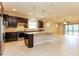 Open concept kitchen with large island and stainless steel appliances at 368 Toldedo Rd, Davenport, FL 33837