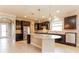Kitchen with large island, granite counters, and stainless steel appliances at 368 Toldedo Rd, Davenport, FL 33837
