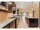 Modern kitchen with granite countertops and stainless steel appliances at 368 Toldedo Rd, Davenport, FL 33837