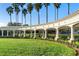Landscaped Town Park entrance with palms and green space at 1694 Town Park Dr, Port Orange, FL 32129