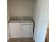 Laundry closet with a washer and dryer at 1210 Southstation Pl # 202, Orlando, FL 32809