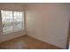 This vacant bedroom has great light, neutral walls, and tile floors at 4340 S Kirkman Rd # 905, Orlando, FL 32811