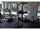 Fitness center featuring various workout machines and natural lighting at 4340 S Kirkman Rd # 905, Orlando, FL 32811