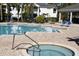 Resort-style pool with a hot tub for relaxing and lounging at 4340 S Kirkman Rd # 905, Orlando, FL 32811