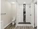 Updated bathroom with a large walk-in shower, toilet and modern finishes at 3046 Crystal Hills Dr, Lakeland, FL 33801